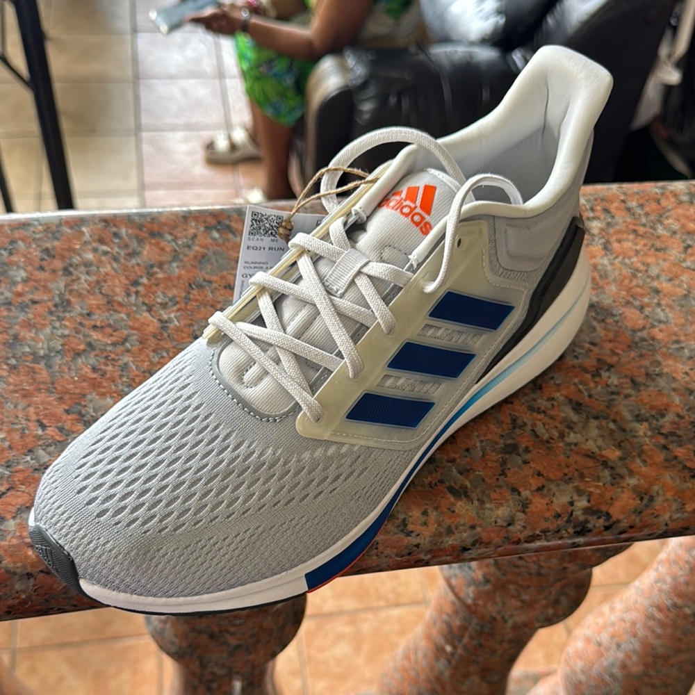Adidas Gray Sneakers with Blue Stripes